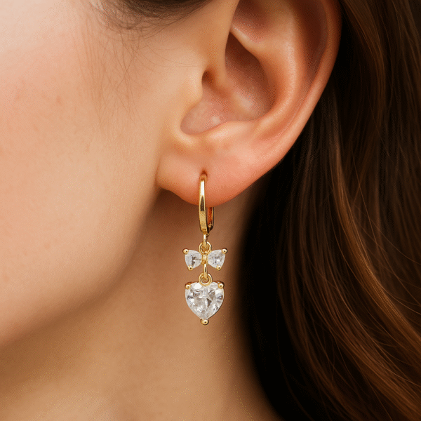 Gold-Plated Heart Drop Earrings with Bow Accent By Just jewel - Image 2