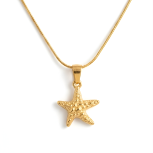 Close-up of a textured Gold Starfish Pendant on a high-shine Snake Chain