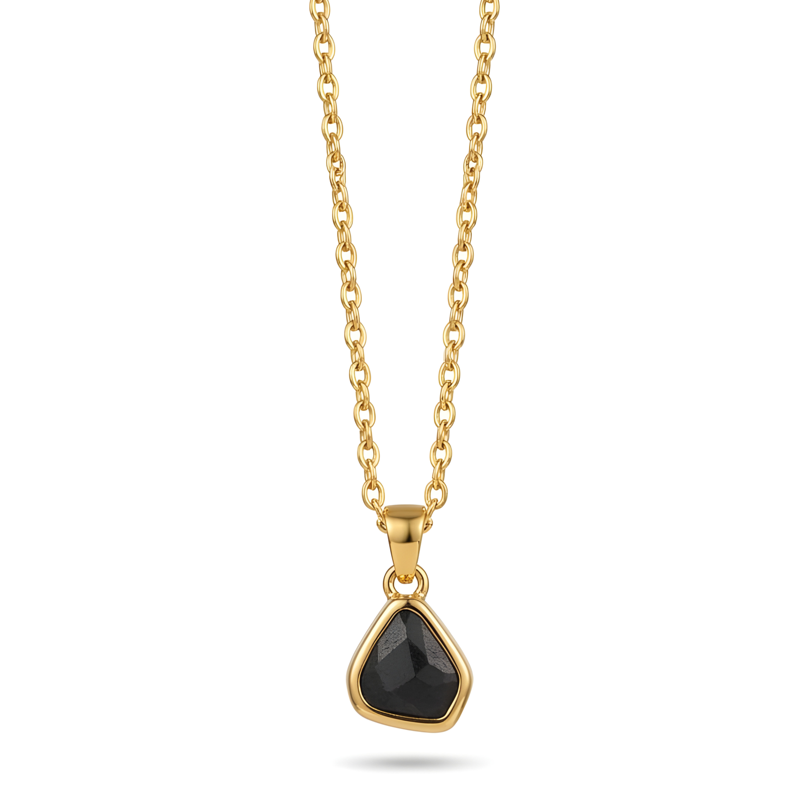 Close-up of a faceted Black Geometric Stone Pendant on an 18K Gold Cable Chain