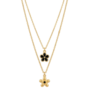 Close-up of a double-layered gold necklace with black enamel and textured gold flower pendants