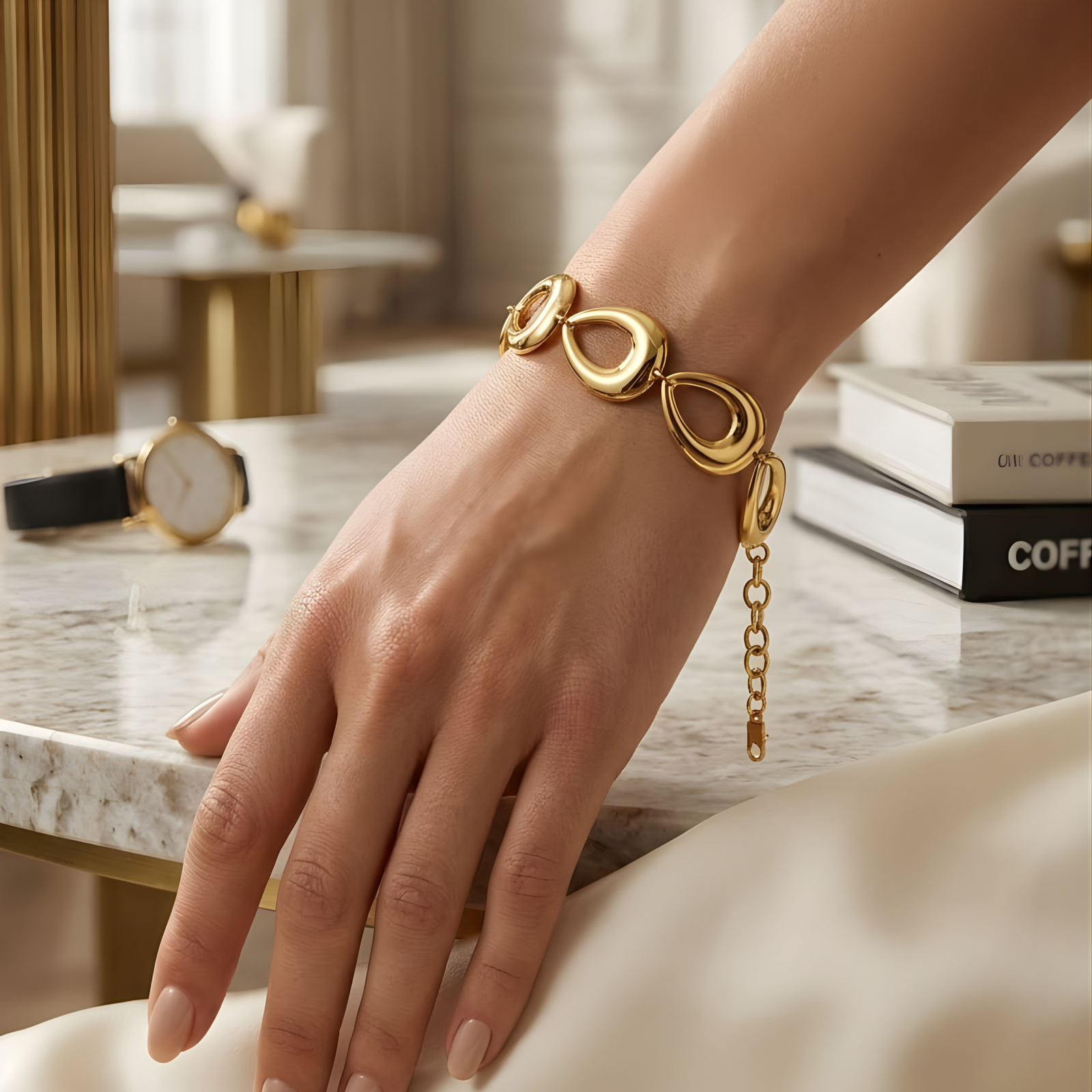 Just Jewel TM Teardrop Link Gold Bracelet on a realistic model's hand