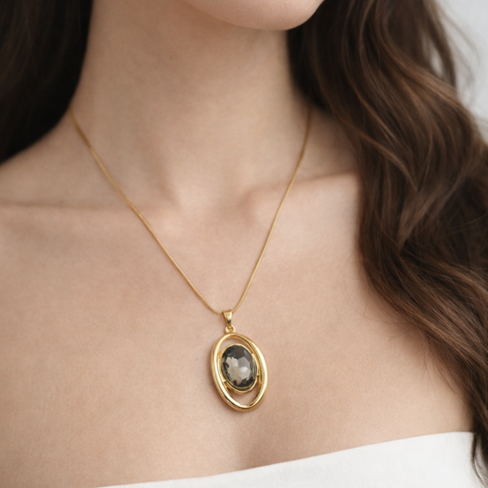 Gold Plated Oval Smokey Crystal Solitaire Pendant Necklace from justjewel.co.in, waterproof and anti-tarnish jewelry.