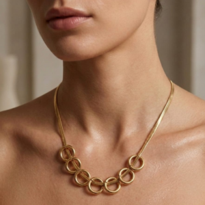 Gold Plated Multi-Ring Charm Snake Chain Necklace from justjewel.co.in, waterproof and anti-tarnish jewelry.