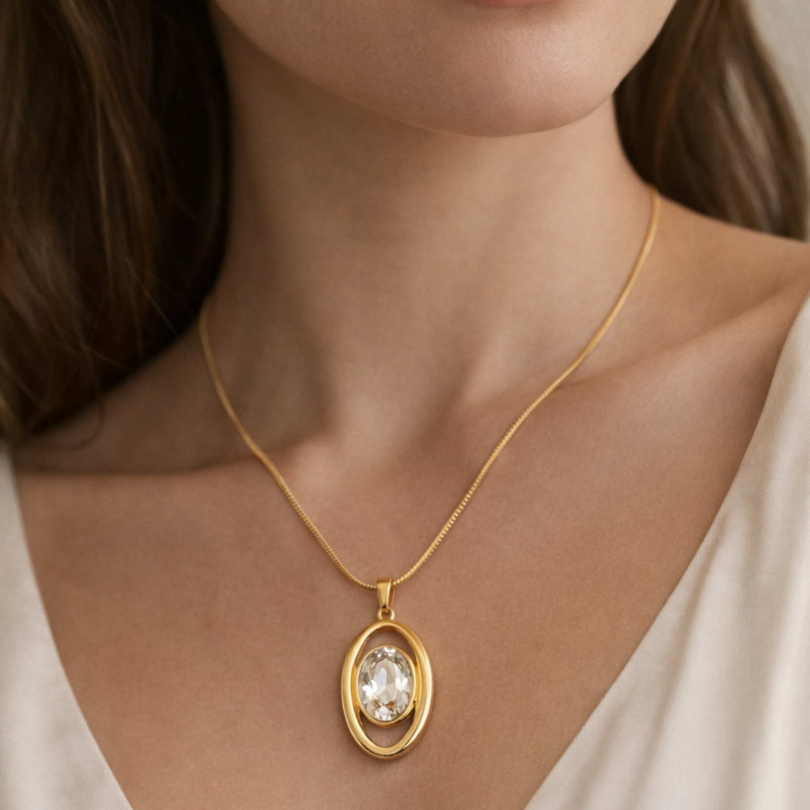 Gold Plated Oval Crystal Solitaire Pendant Necklace from justjewel.co.in, waterproof and anti-tarnish jewelry.