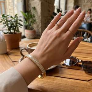 Gold Plated Dual-Border Baguette Crystal Bangle from justjewel.co.in, waterproof and anti-tarnish luxury jewelry.