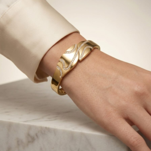 Gold Plated Abstract Wave Crystal Bangle from justjewel.co.in, waterproof and anti-tarnish luxury jewelry.